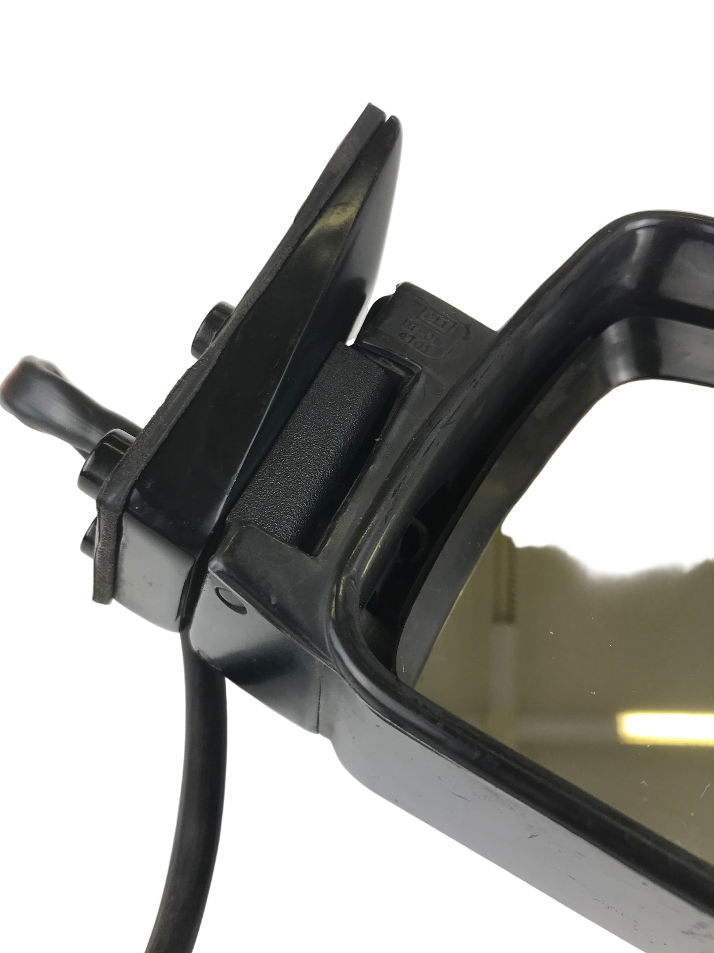 Close-up of a car side mirror on a white background jeep xj